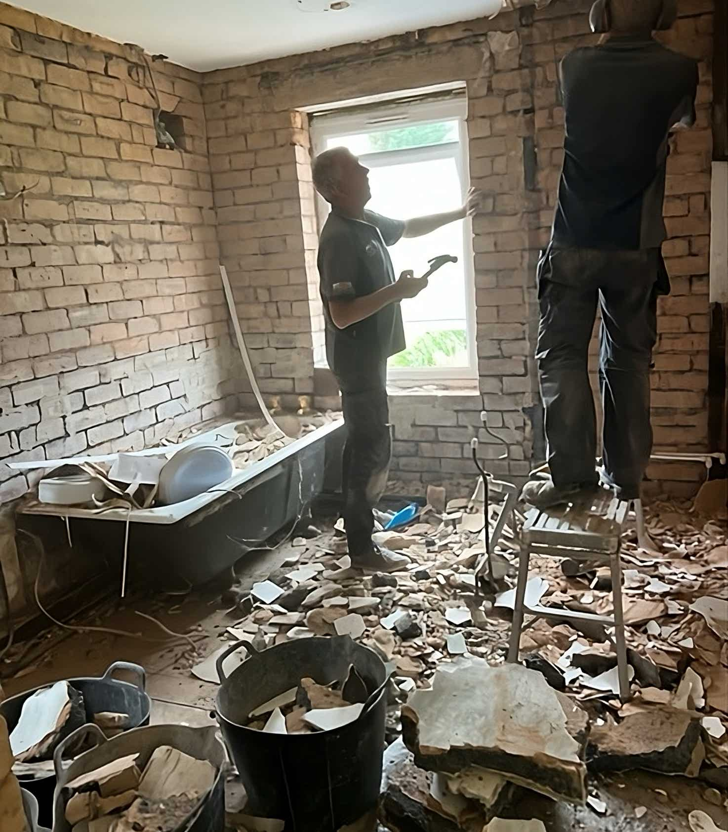 Plumb Yorkshire Ltd. accredited team members ripping out old bathroom