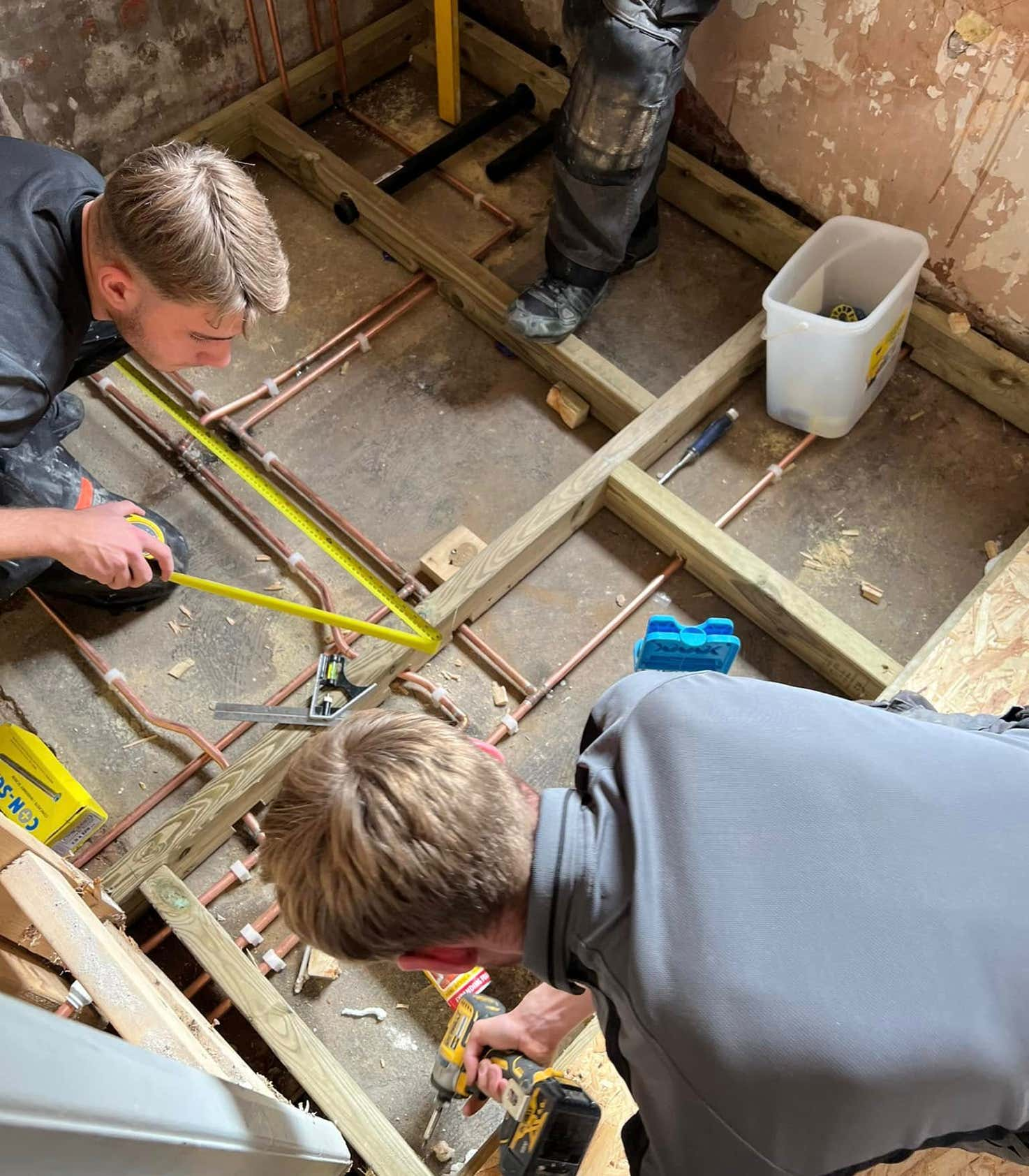 Plumb Yorkshire Ltd. accredited team members ripping out old bathroom