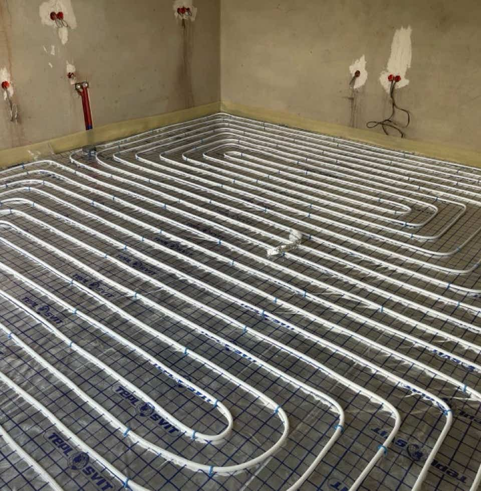 Image of underfloor heating system installation in progress by Plumb Yorkshire ltd.